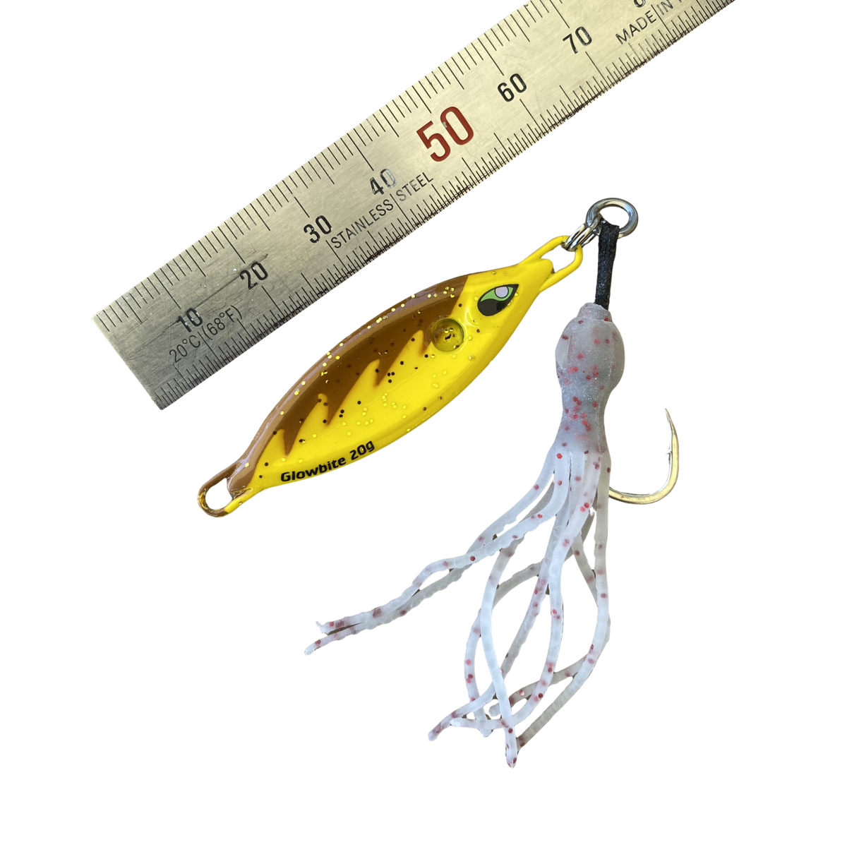 very small yellow lure with white squid skirt