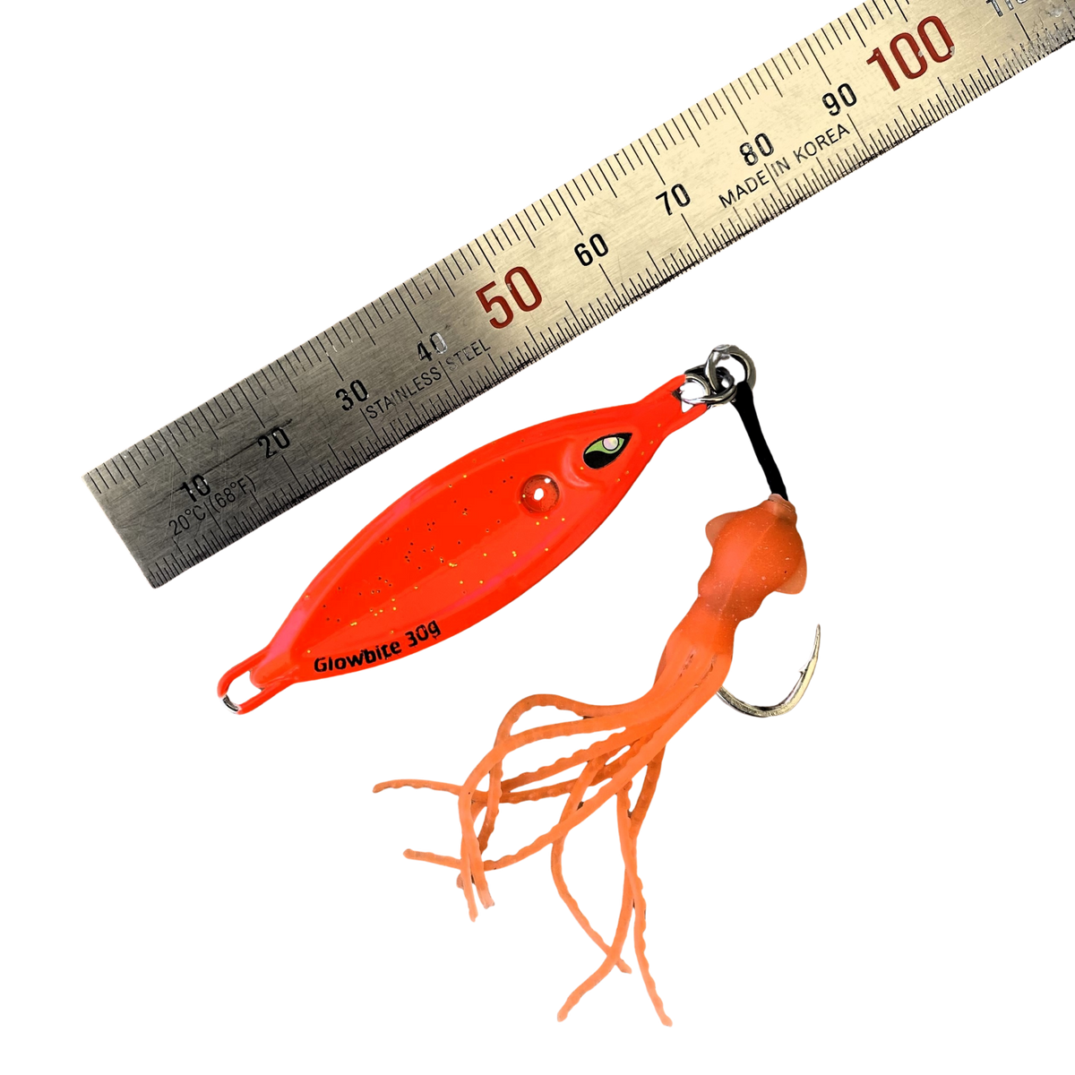 very small orange lure with squid skirt