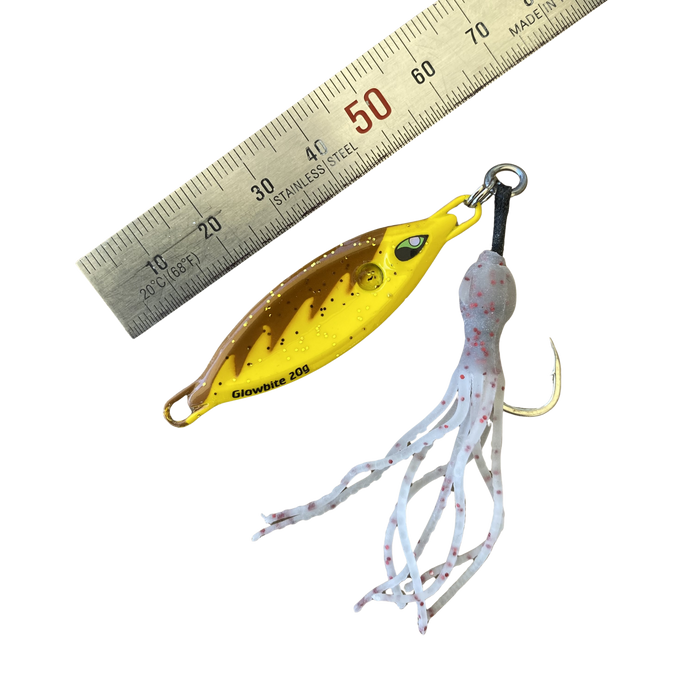 very small yellow lure with white squid skirt