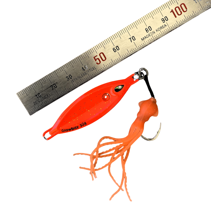 very small orange lure with squid skirt